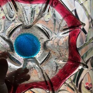 Vibrant Red and Blue Glass Art Piece